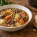 Staffordshire lobby stew served with crusty bread — illustrative image
